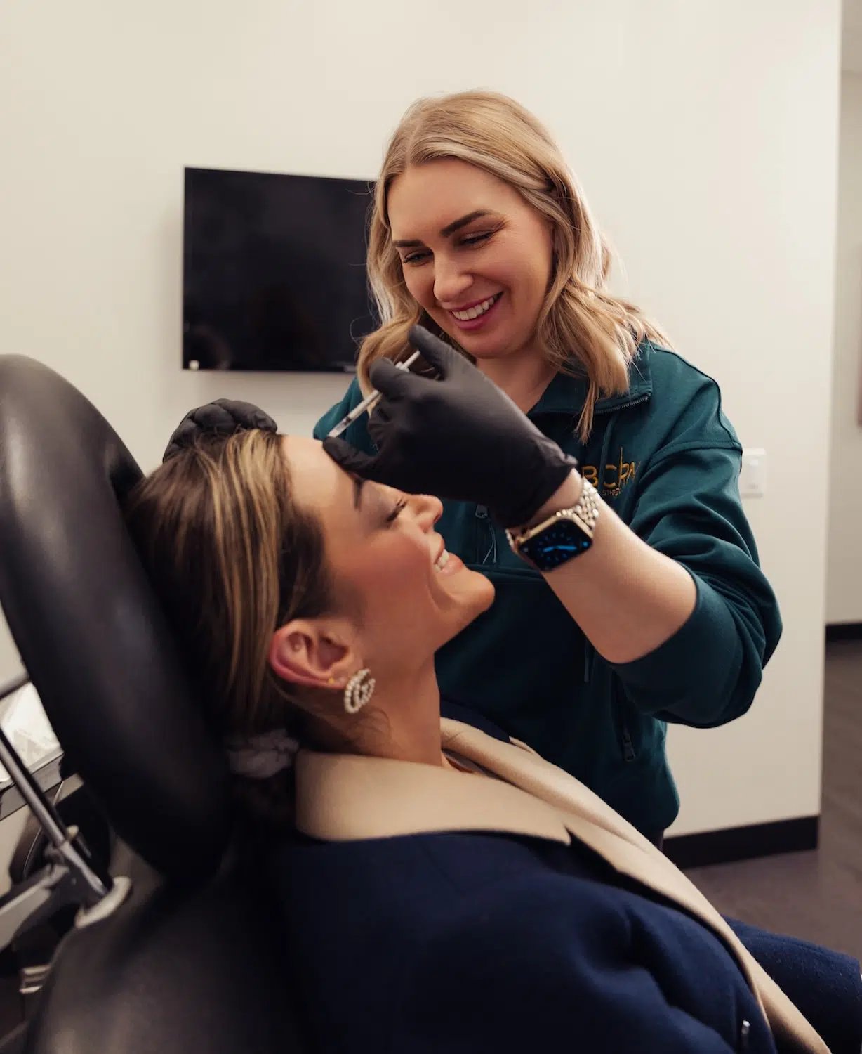 woman receiving injectable treatment at bcrn aesthetics woman receiving injectable treatment at bcrn aesthetics