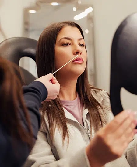 woman receiving consultation at bcrn aesthetics woman receiving consultation at bcrn aesthetics
