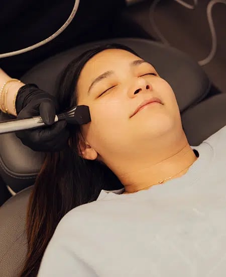 woman receiving forma skin tightening at bcrn x woman receiving forma skin tightening at bcrn x